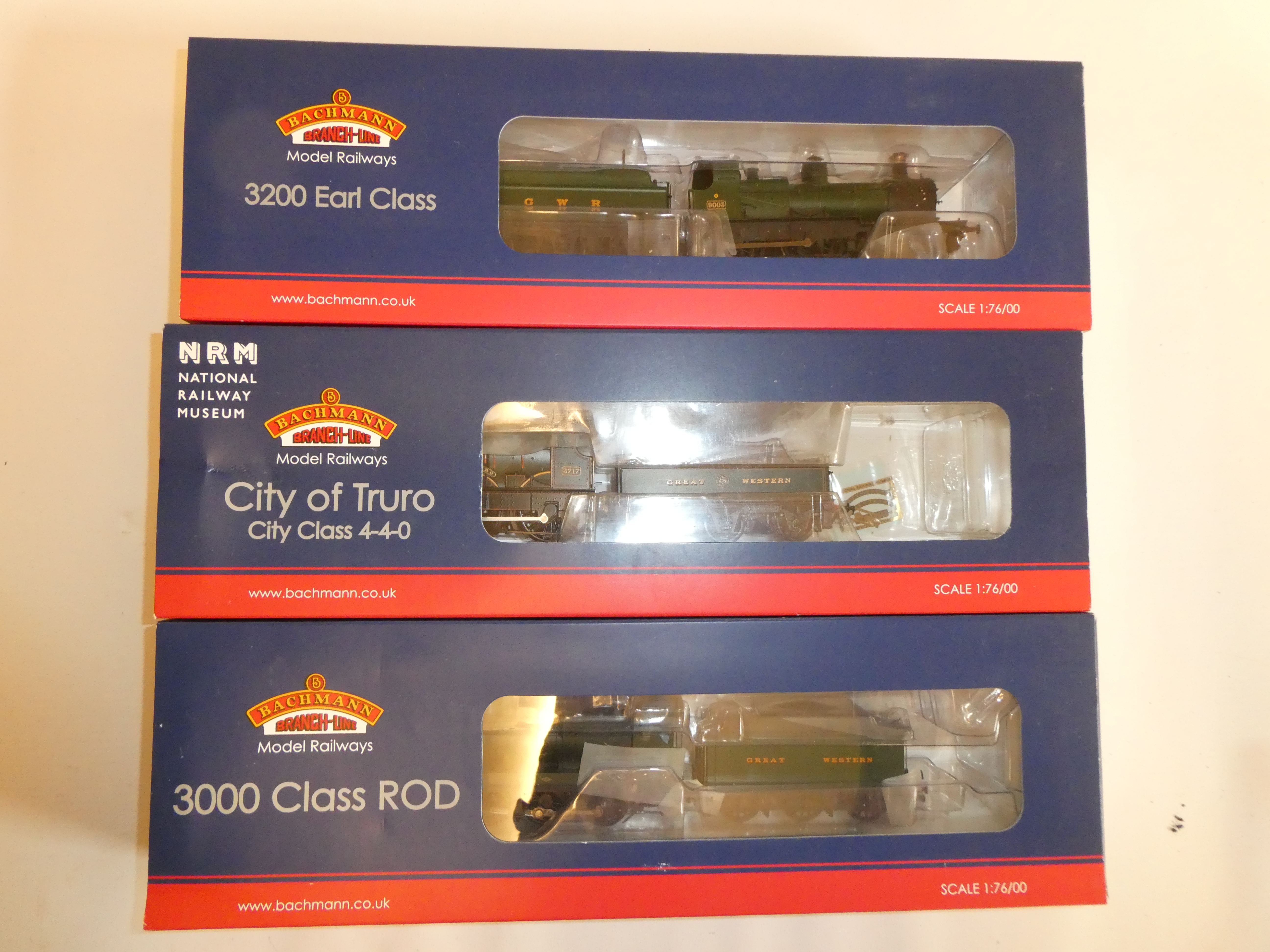 Three Bachmann locomotives comprising G.W.R. Earl 9003, City of Truro and ROD 3031, all items boxed, Image