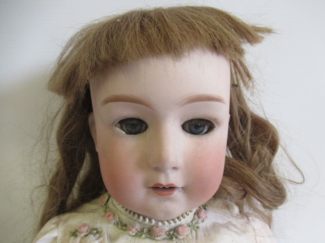 A Gebruder Heubach bisque socket head doll Image