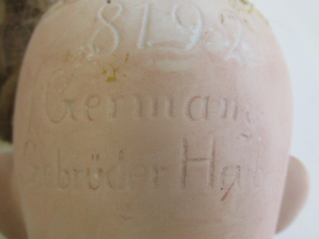 A Gebruder Heubach bisque socket head doll Image