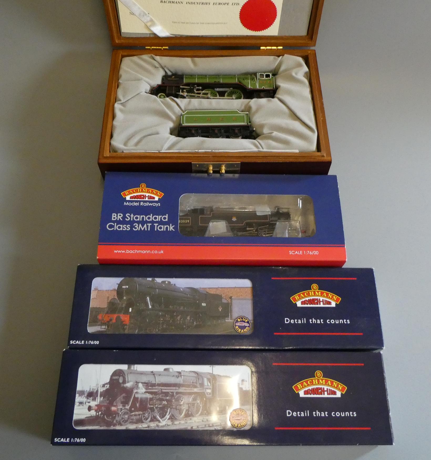Four Bachmann locomotives comprising B.R. Standard Class 5 73185, W.D. Austerity in WW2 khaki, B.R. Image