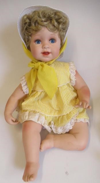 Five Ashton Drake baby dolls, all ceramic with jointed necks, shoulders and hips, one in a bath tub, Image