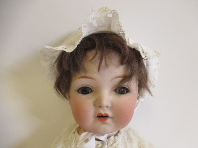 A Gebruder Heubach bisque socket head doll Image