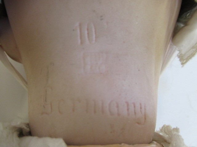 A Gebruder Heubach bisque socket head doll Image