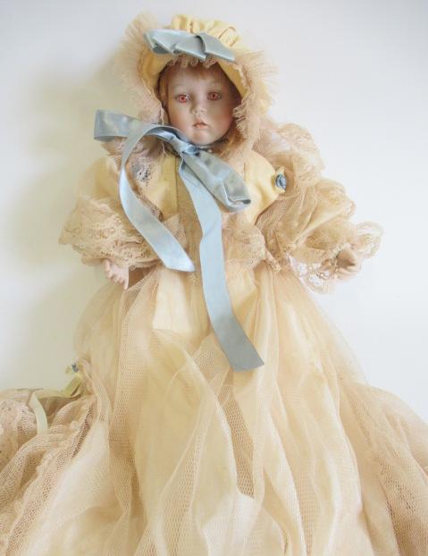 Six Ashton Drake all ceramic dolls, with jointed bodies and pink eyes, largest 17 1/2" long (Est. Image