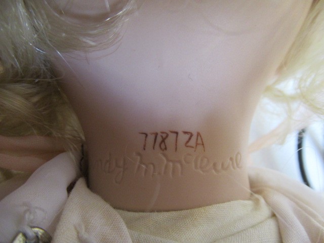 Six Ashton Drake all ceramic dolls, with jointed bodies and pink eyes, largest 17 1/2" long (Est. Image