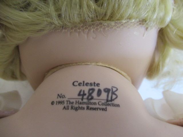 Six Ashton Drake all ceramic dolls, with jointed bodies and pink eyes, largest 17 1/2" long (Est. Image