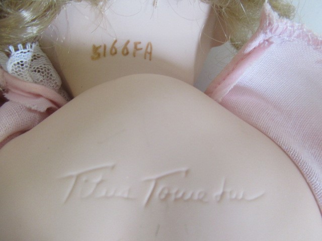 Six Ashton Drake all ceramic dolls, with jointed bodies and pink eyes, largest 17 1/2" long (Est. Image