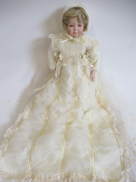 Six Ashton Drake all ceramic dolls, with jointed bodies and pink eyes, largest 17 1/2" long (Est. Image