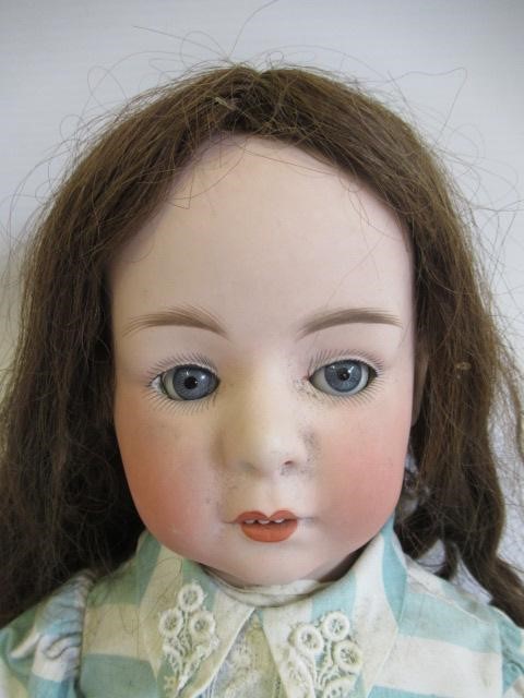 A Heubach bisque socket head doll Image