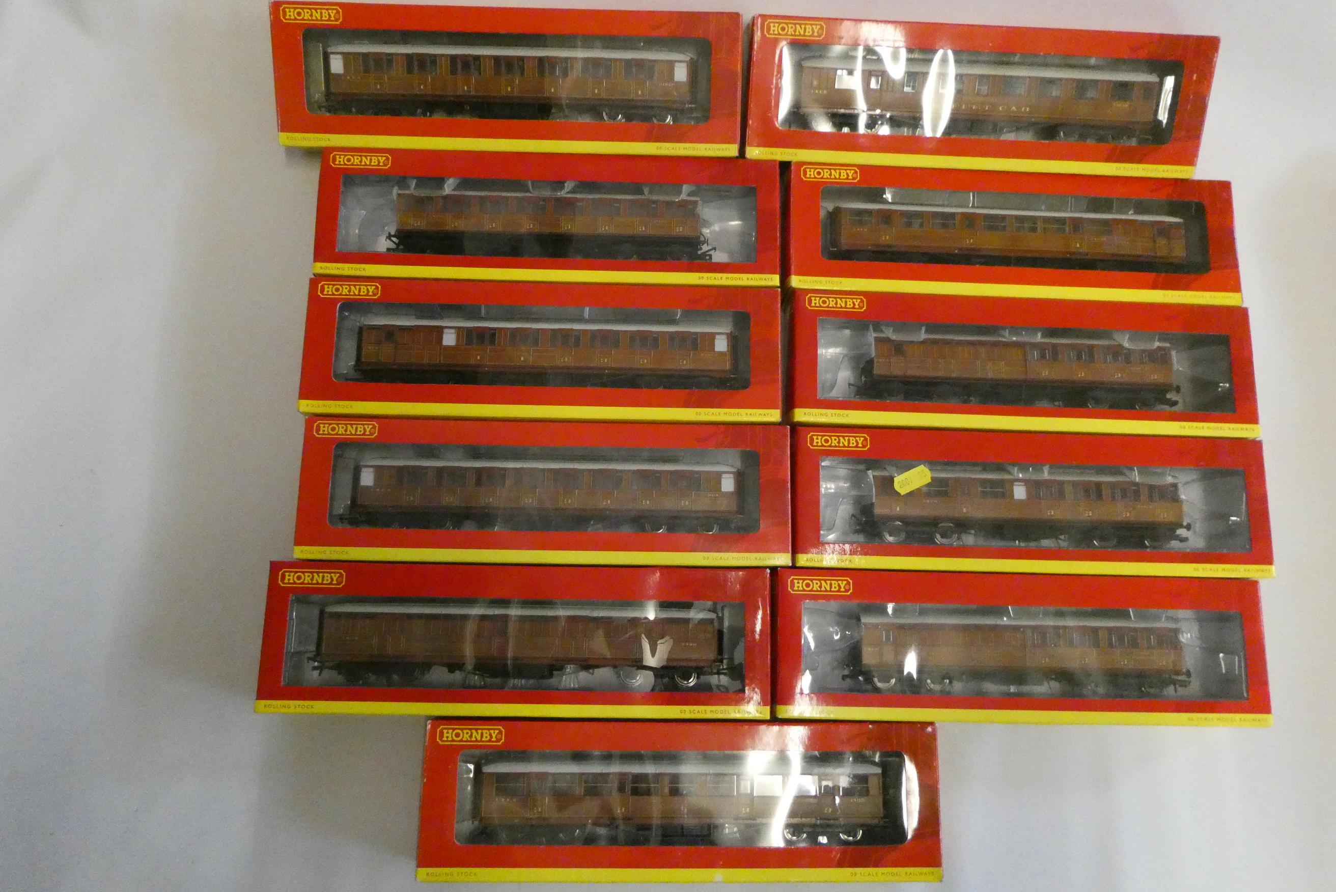 Twenty five passenger coaches by Hornby and Mainline including L.N.E.R. teak, L.M.S. and G.W.R., Image