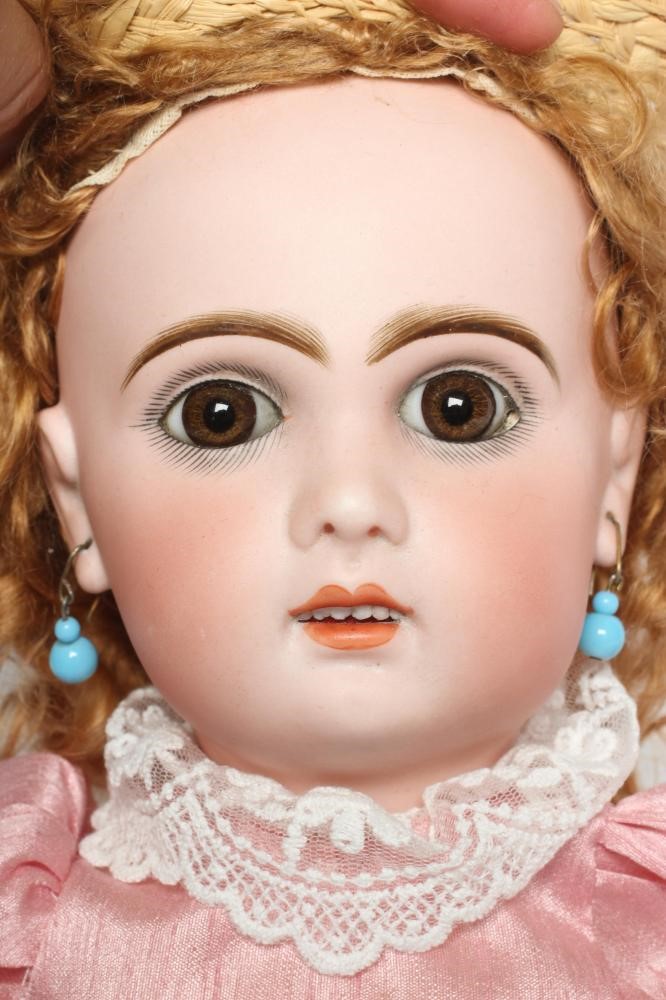 A Bebe Jumeau bisque socket head doll Image