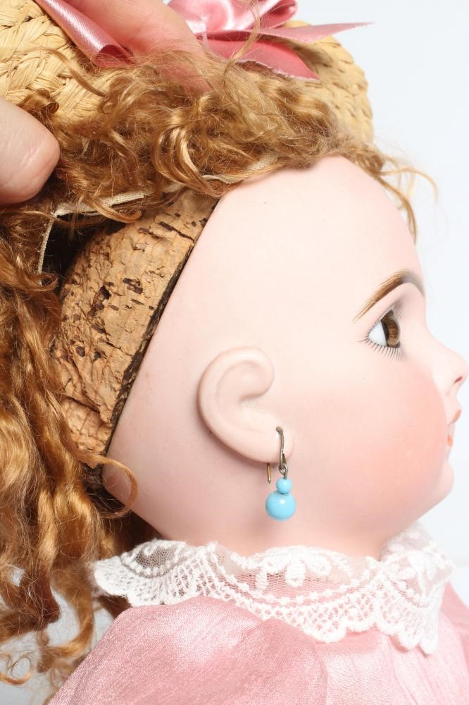 A Bebe Jumeau bisque socket head doll Image