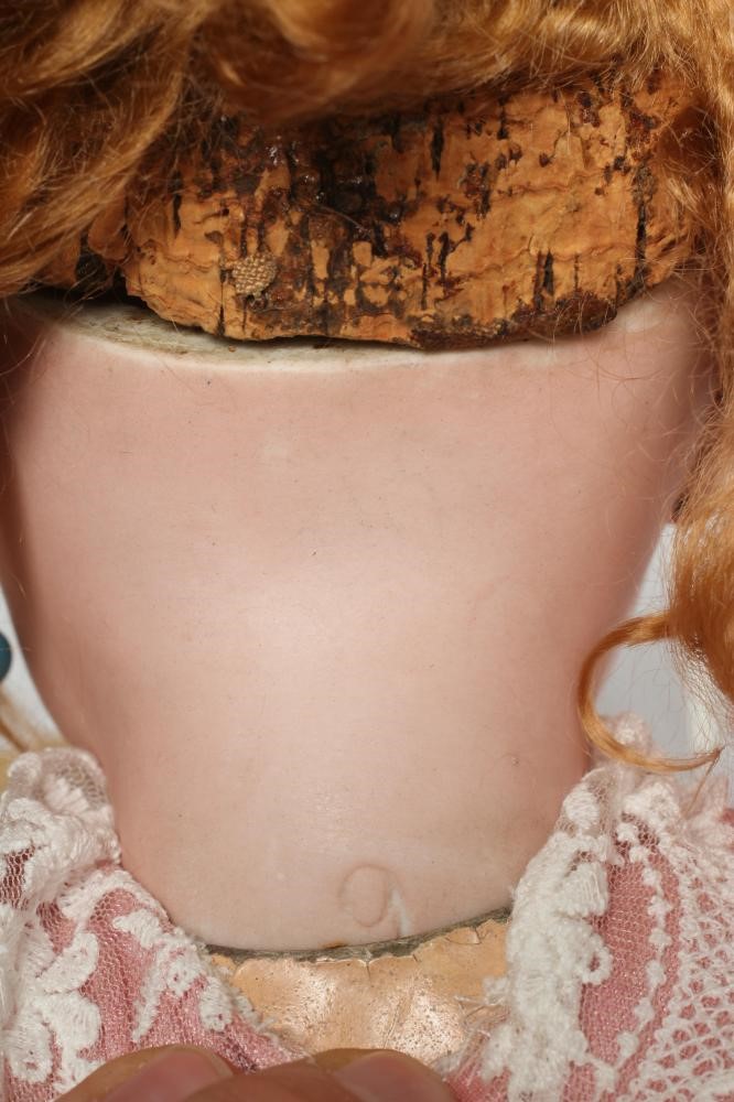 A Bebe Jumeau bisque socket head doll Image