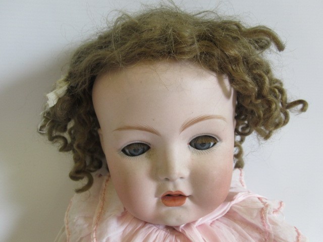A Heubach bisque socket head character doll Image
