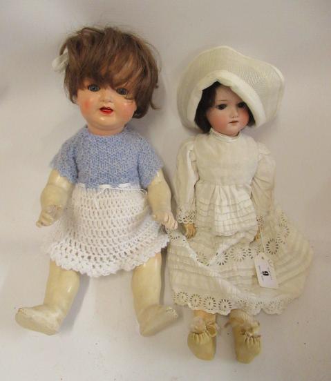 Two bisque socket head German dolls Image