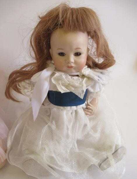 Four Ashton Drake dolls, all with ceramic jointed bodies, 16" long (Est. plus 24% premium inc. VAT) Image