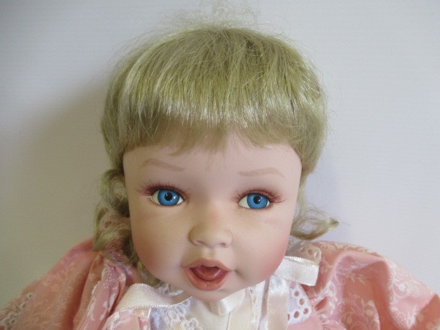 Four Ashton Drake dolls, all with ceramic jointed bodies, 16" long (Est. plus 24% premium inc. VAT) Image