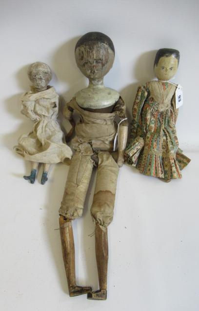 Three Victorian peg dolls Image