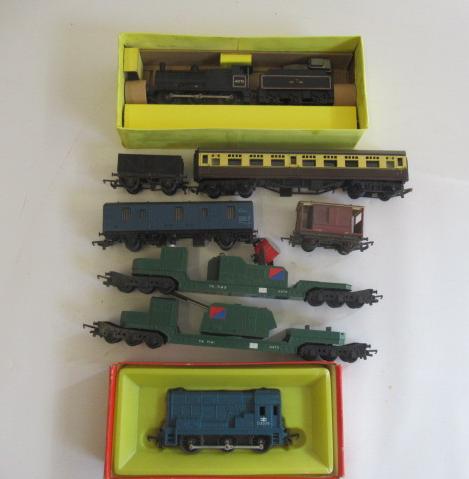 Unboxed Triang trains including 0-6-0 diesel shunter, 0-6-0 3F steam locomotive and wagons, F-G Image