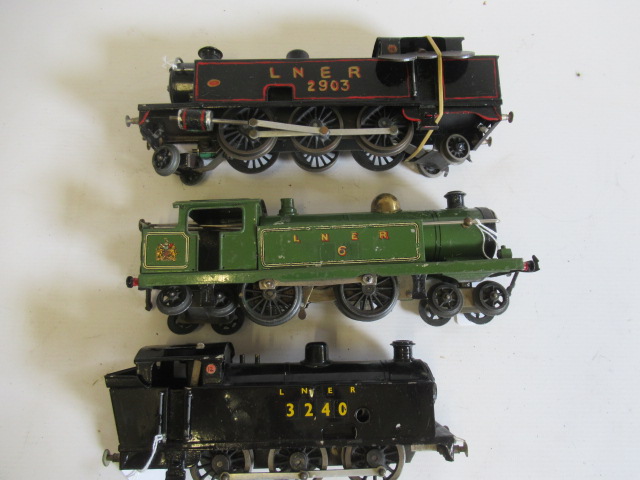 Three clockwork L.N.E.R. tank locomotives comprising Hornby 4-4-4, home-made 2-6-2T and 0-6-0T, F-P Image