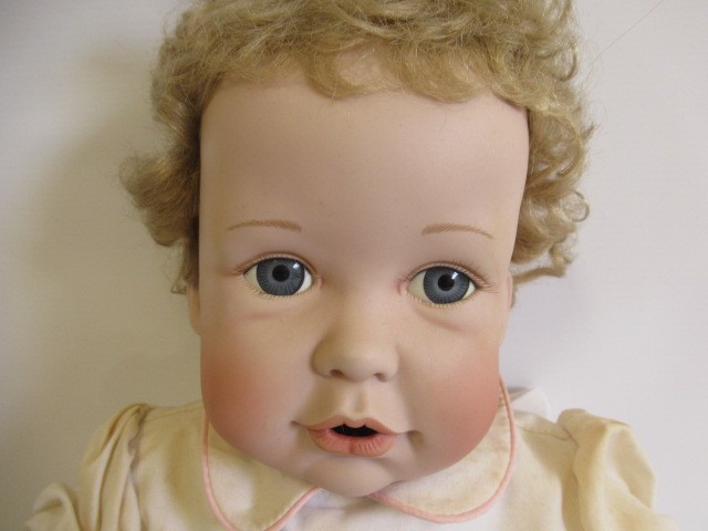 Four large collectors dolls, all with ceramic heads and limbs, largest 27 3/4" tall, together with Image