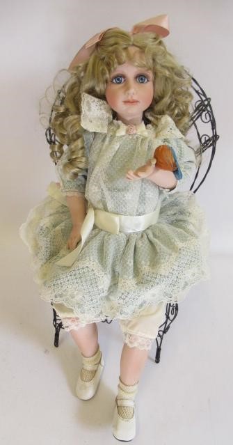 Four large collectors dolls, all with ceramic heads and limbs, largest 27 3/4" tall, together with Image