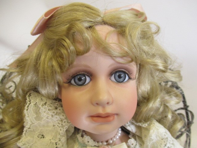 Four large collectors dolls, all with ceramic heads and limbs, largest 27 3/4" tall, together with Image