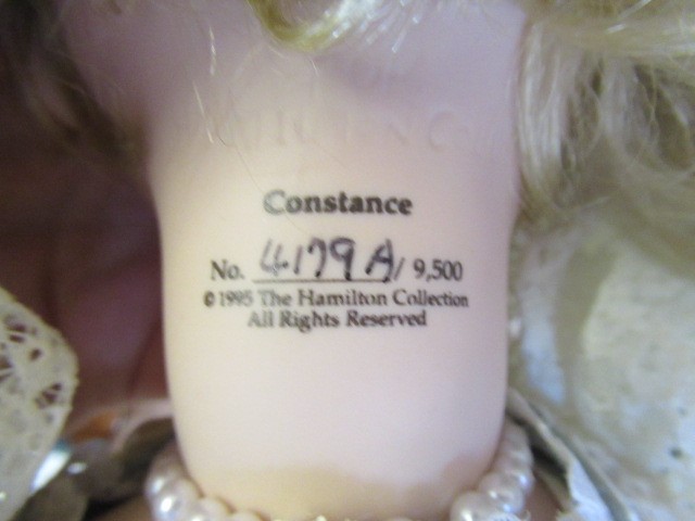 Four large collectors dolls, all with ceramic heads and limbs, largest 27 3/4" tall, together with Image