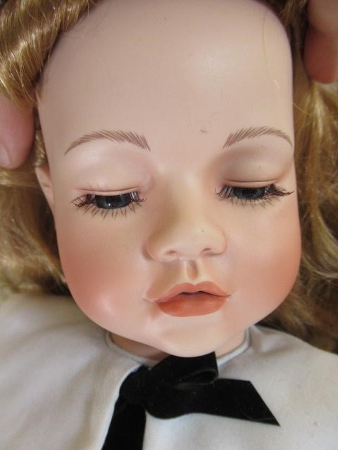 Four large collectors dolls, all with ceramic heads and limbs, largest 27 3/4" tall, together with Image