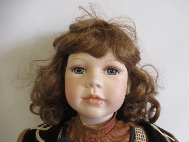 Four large collectors dolls, all with ceramic heads and limbs, largest 27 3/4" tall, together with Image