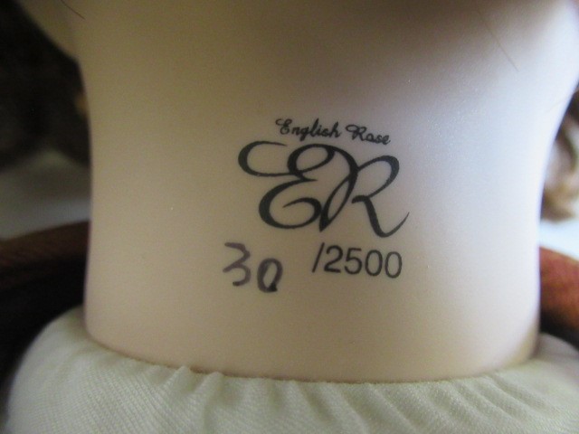 Four large collectors dolls, all with ceramic heads and limbs, largest 27 3/4" tall, together with Image