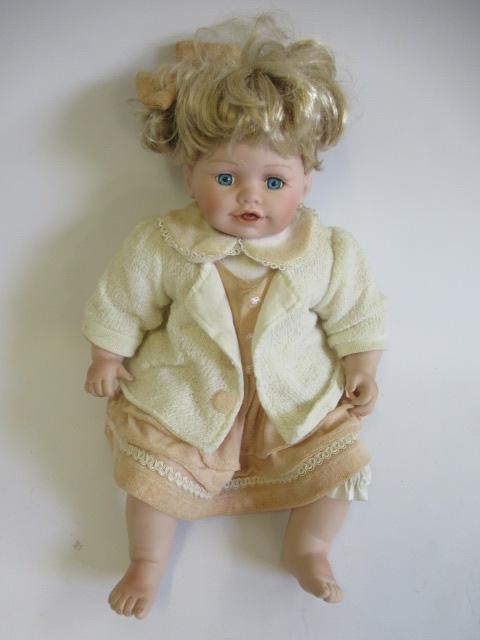 Four large collectors dolls, all with ceramic heads and limbs, largest 27 3/4" tall, together with Image