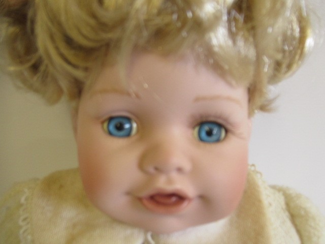 Four large collectors dolls, all with ceramic heads and limbs, largest 27 3/4" tall, together with Image