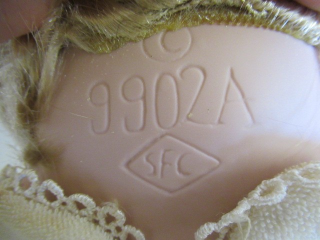 Four large collectors dolls, all with ceramic heads and limbs, largest 27 3/4" tall, together with Image