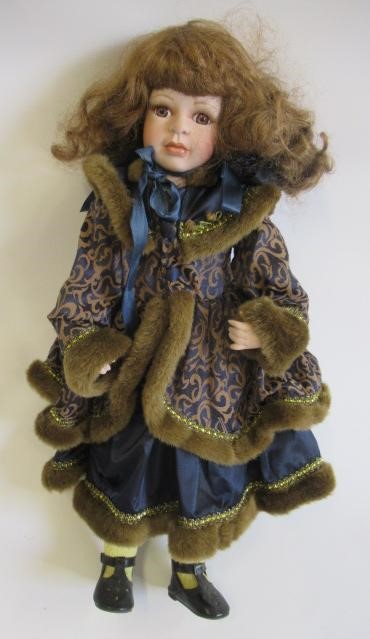 Four large collectors dolls, all with ceramic heads and limbs, largest 27 3/4" tall, together with Image