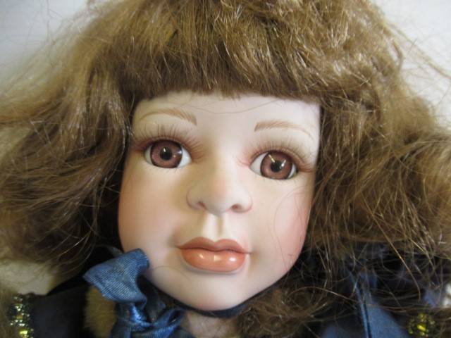 Four large collectors dolls, all with ceramic heads and limbs, largest 27 3/4" tall, together with Image