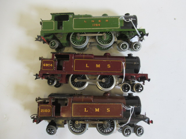 Three Hornby clockwork L.N.E.R./LMS tank locomotives, some paint loss/fading, P-F (Est. plus 24% Image