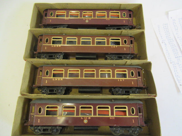 Four boxed Hornby No.2 L.M.S. saloon coaches, some paint damage, boxes F-P (Est. plus 24% premium Image