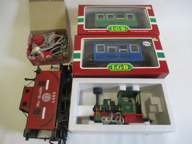 L.G.B. German tank locomotive 21140, two German four wheel coaches and American brake van and an Image