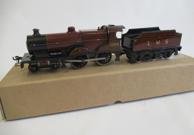 Bassett-Lowke electric L.M.S. 4-4-0 Compound finished in red 1108 to cab, rear tender trademark Image