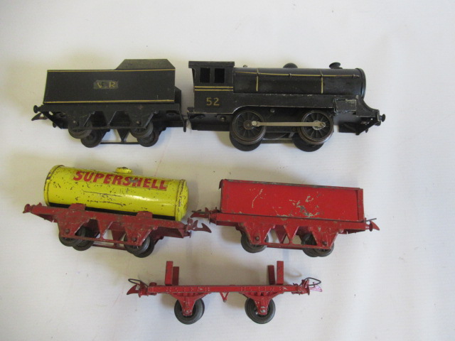 Robilt of Australia clockwork 0-4-0 locomotive and tender finished in black with 52 to cab and three Image