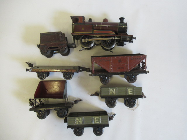 Marklin electric 0-4-0 locomotive and tender finished in M.R. red with five goods wagons, minor Image