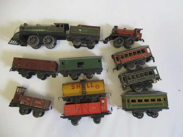 German manufacture rolling stock including goods wagons, four wheel coaches and two clockwork Image