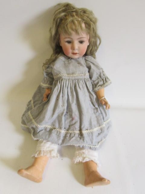 Two restored Heubach bisque socket head dolls Image