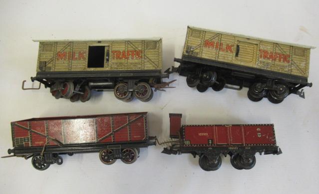 Four Bing Continental goods wagons comprising two milk vans and two open wagons, P-F (Est. plus 24% Image