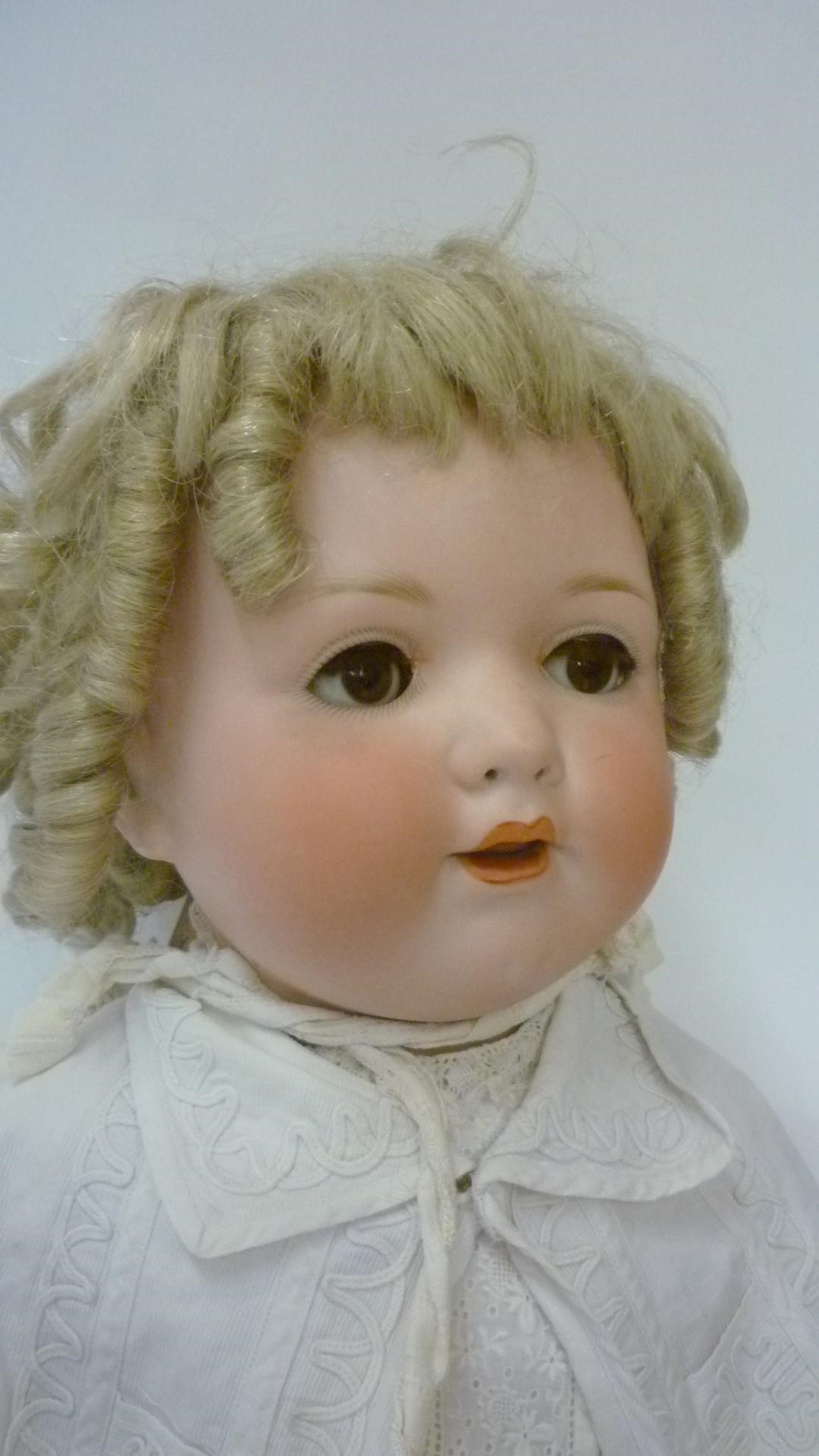 An Edmund Edelmann "Melitta" bisque head character doll with brown glass sleeping eyes Image