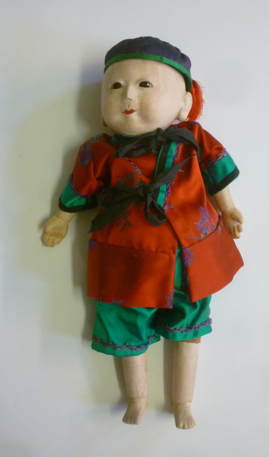 A Japanese Motschann type composition boy doll with fixed glass eyes Image