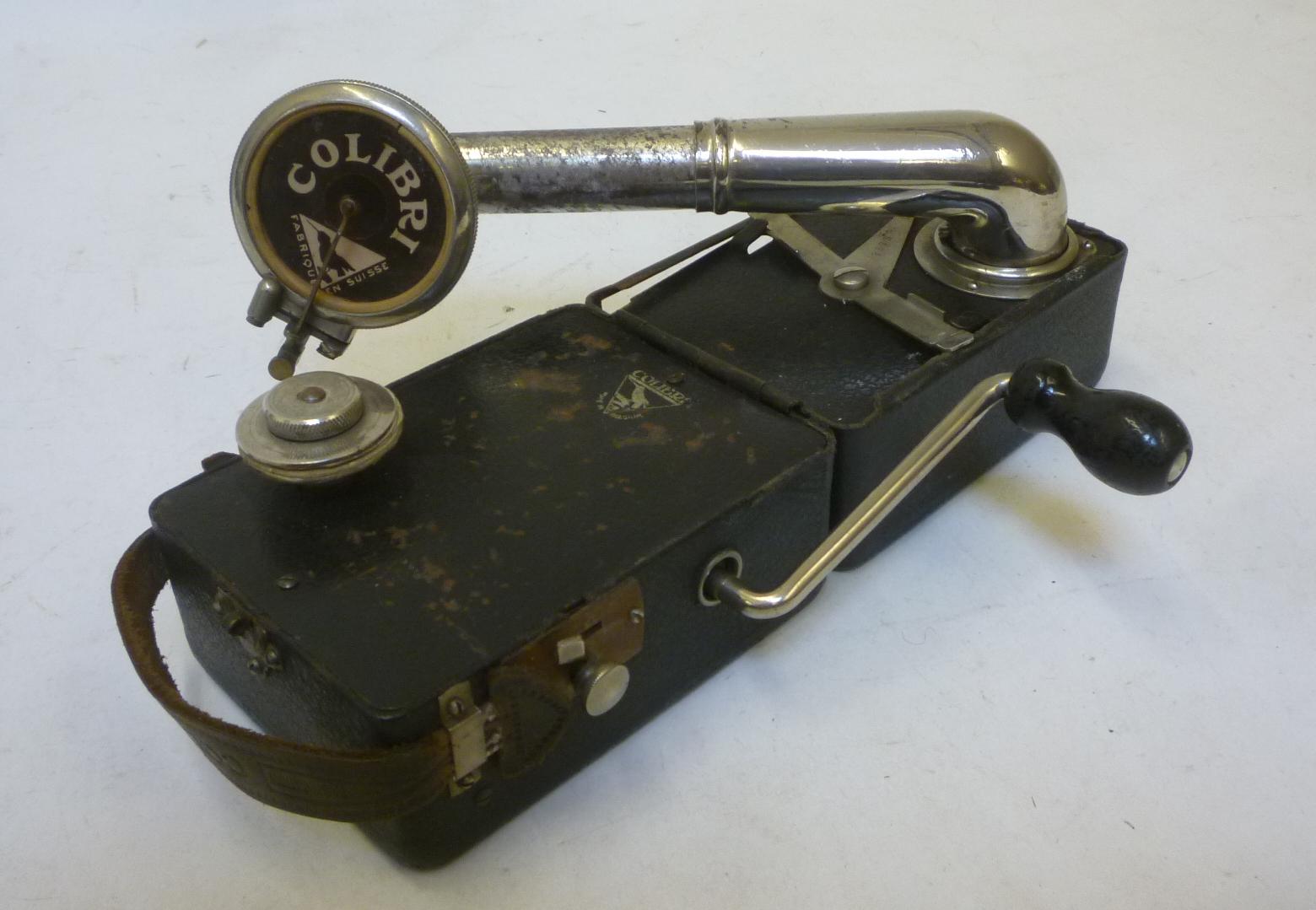 A Colibri "camera" gramophone with folding black metal case Image