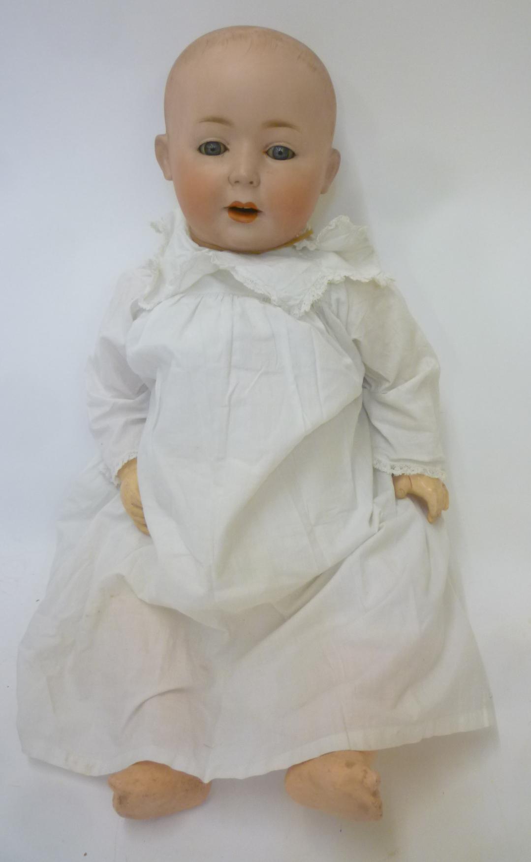 A German bisque head boy character doll Image
