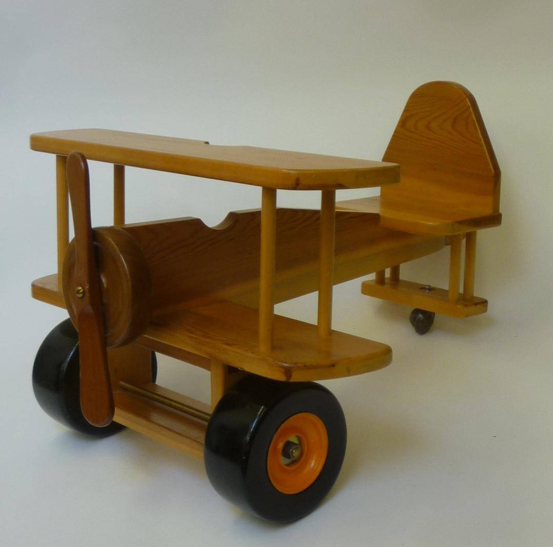 A scratch built ride-on bi-plane in pine and hardwood Image